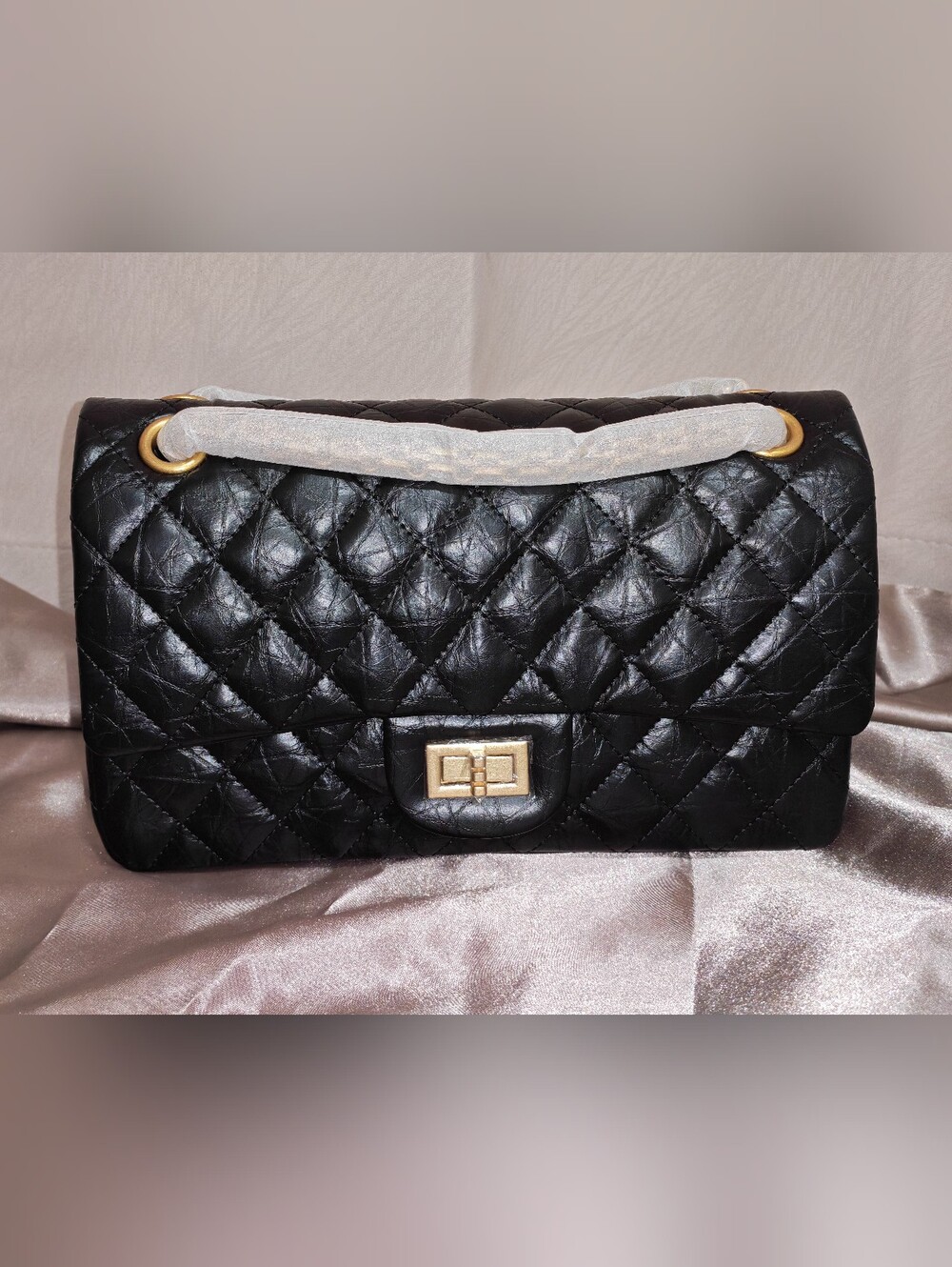 Classic Quilted Black Leather Shoulder Bag with Gold Hardware